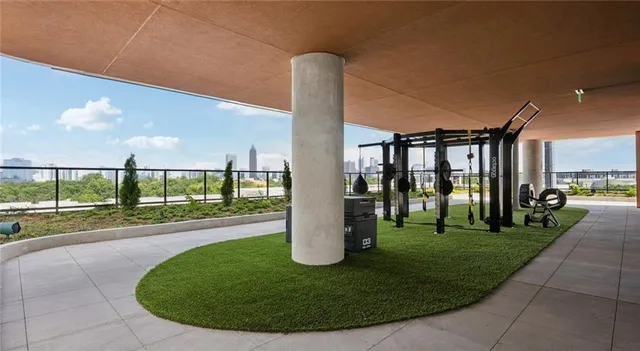 a view of a kitchen with a table and chairs