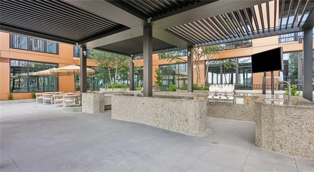 a view of a bedroom with a bed and bathroom
