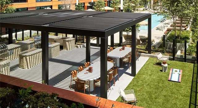 a living room with furniture fireplace and a window