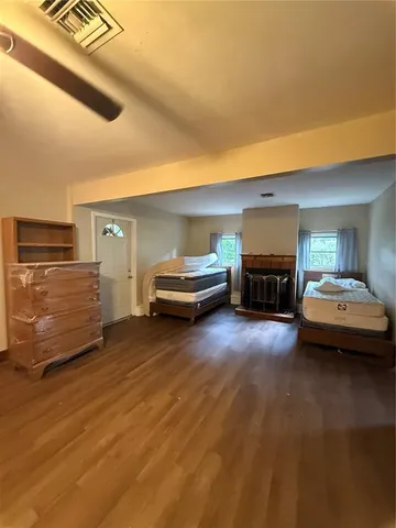 a outdoor space with a table and chairs