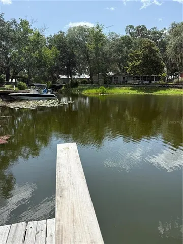 a view of a lake with a large lake in the back