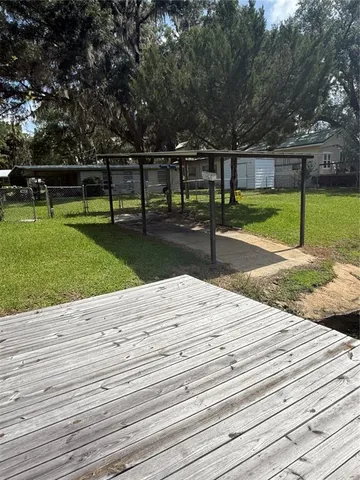 a park view with a bench