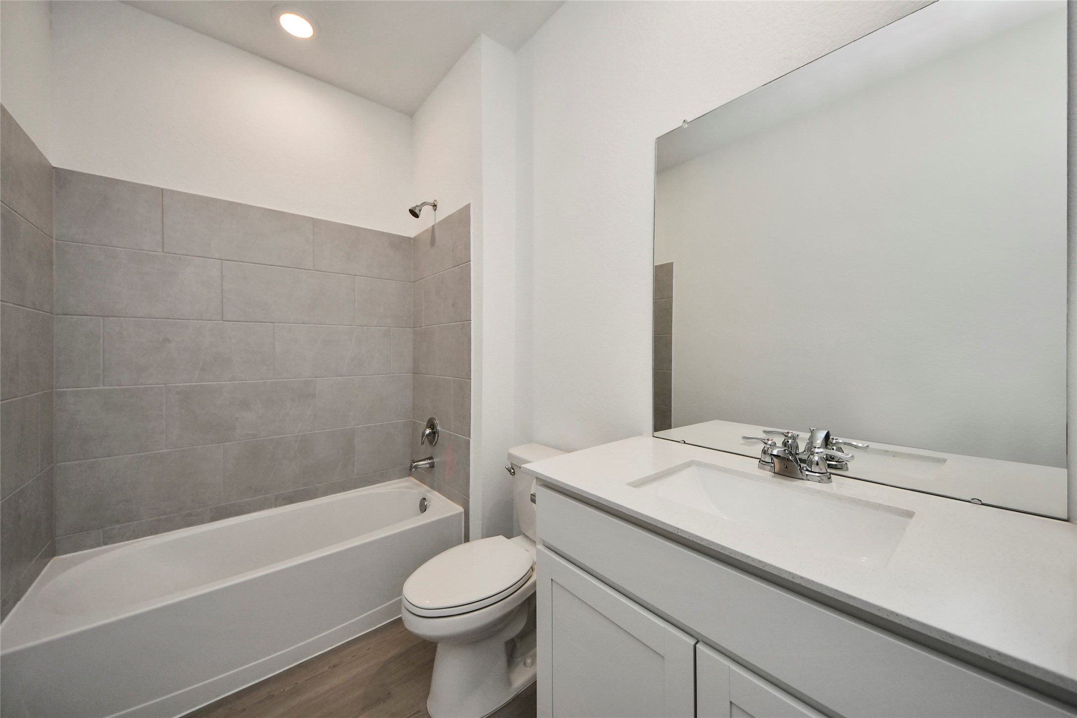 26418 Virginia Wild Rye Lane Katy, TX 77493 - Photo 17 of 26 a bathroom with a sink a toilet and bathtub