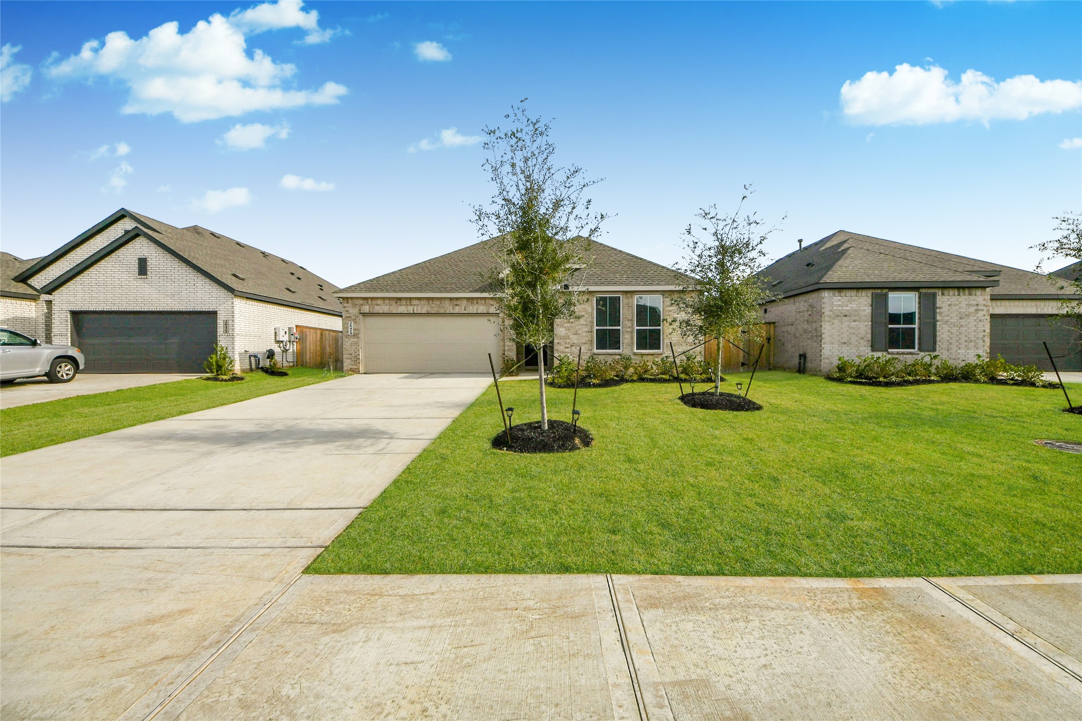 26418 Virginia Wild Rye Lane Katy, TX 77493 - Photo 2 of 26 a front view of house with yard and green space