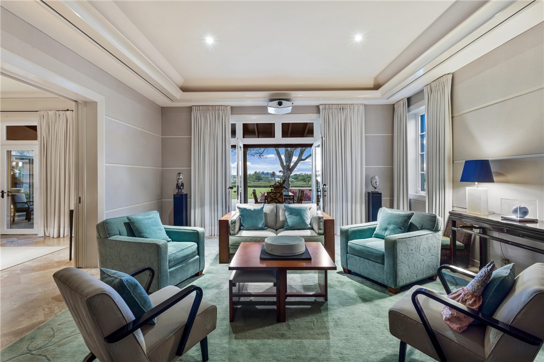 2350 Quay Dock Road Vero Beach, FL 32967 - Photo 11 of 33 a living room with furniture and a large window