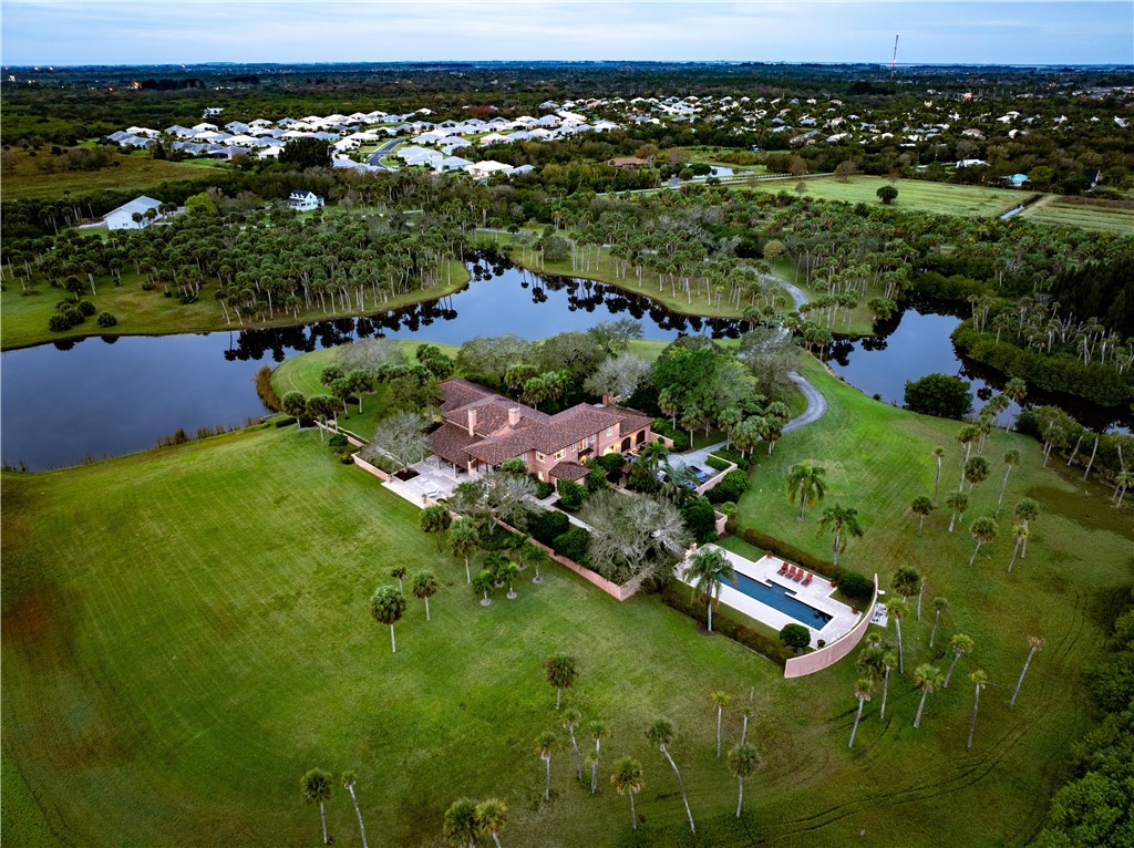 2350 Quay Dock Road Vero Beach, FL 32967 - Photo 31 of 33 a view of a house with a yard