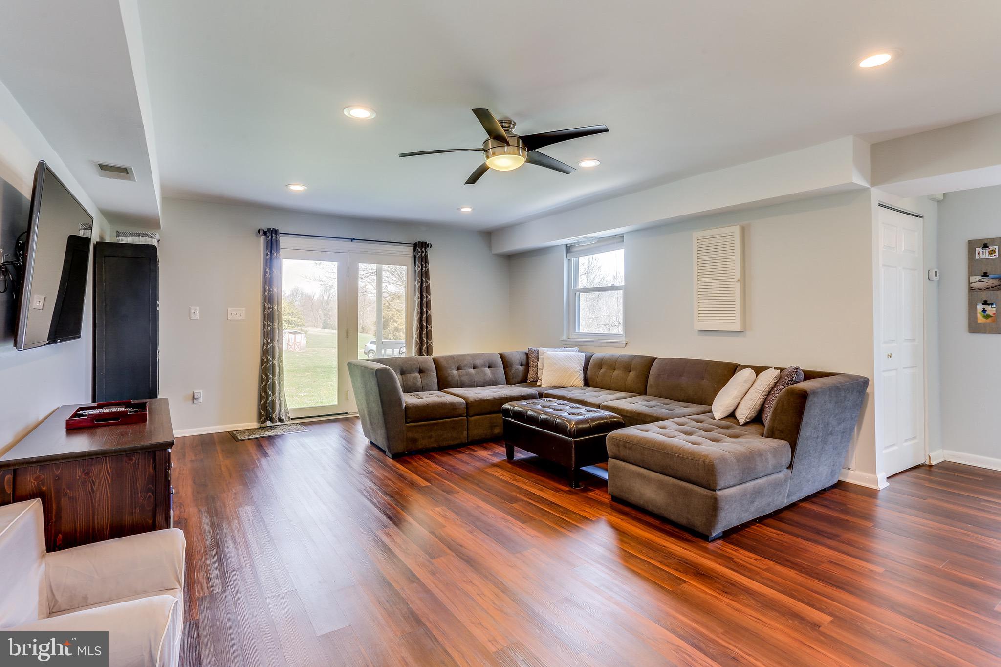 4988 Green Bridge Road Dayton, MD 21036 - Photo 15 of 34 Large Family Room w/ Access to Covered Deck