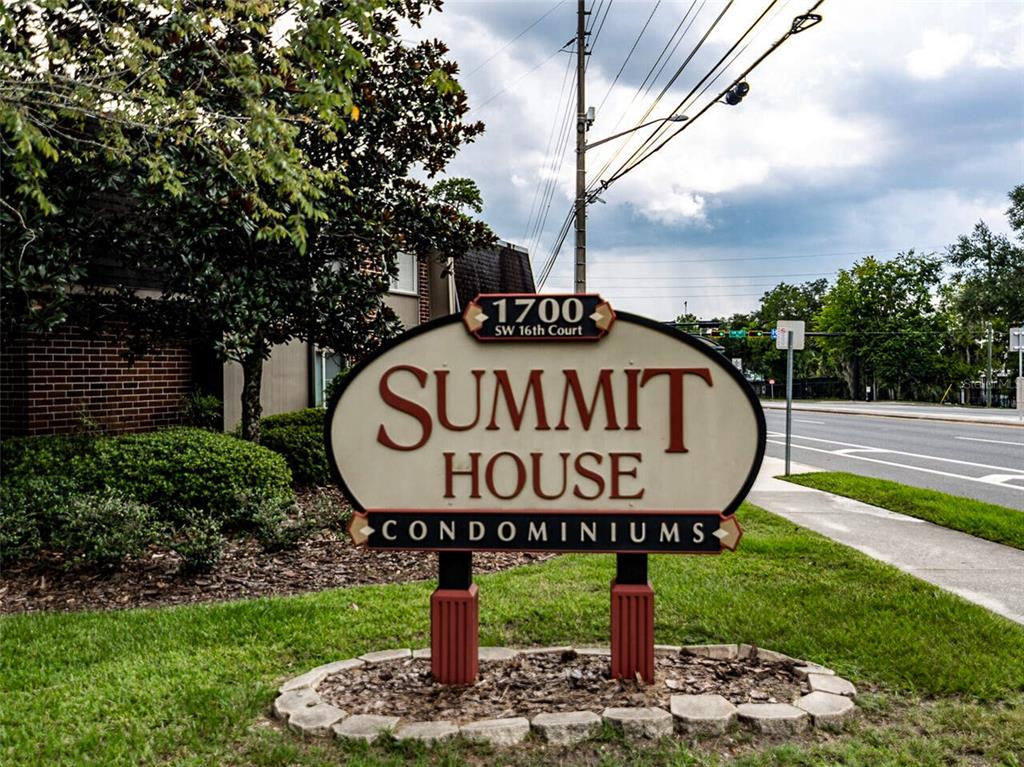 a sign on the side of a road