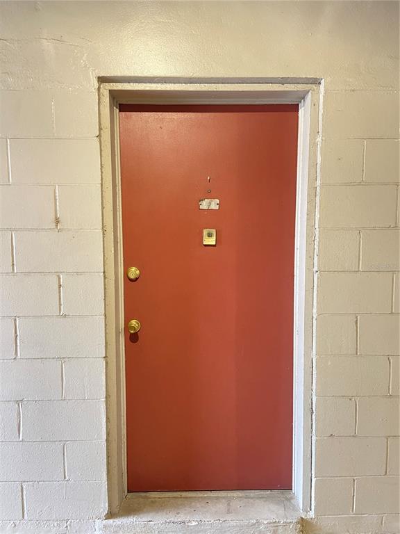 1700 Southwest 16th Court, Unit E8 Gainesville, FL 32608 - Photo 3 of 9 a view of door