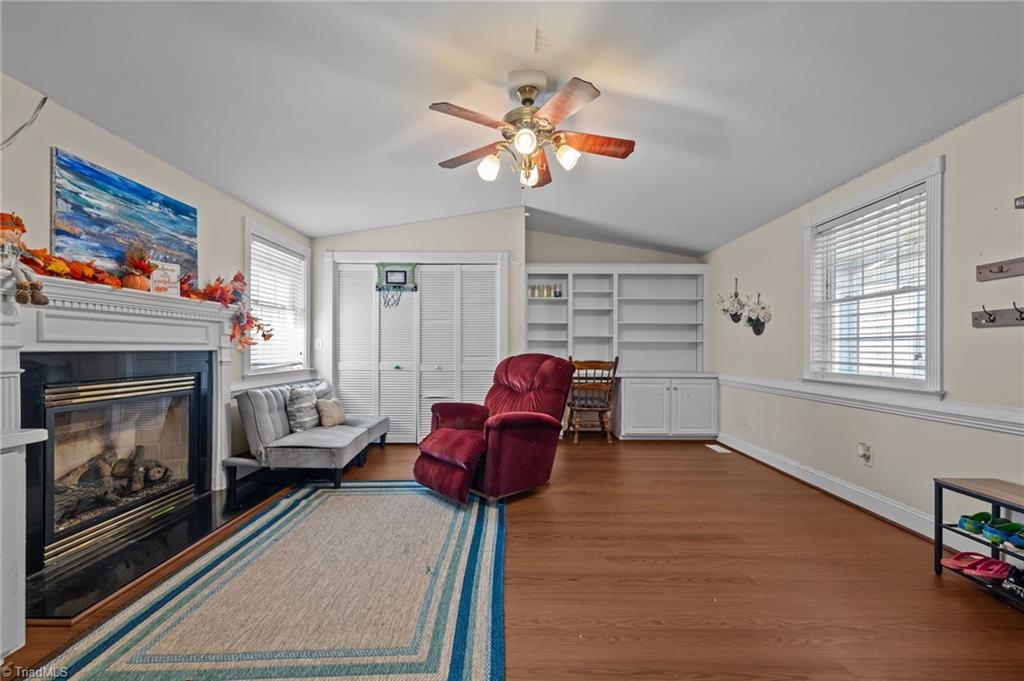 2348 John Thompson Road Graham, NC 27253 - Photo 21 of 34 Den with fireplace