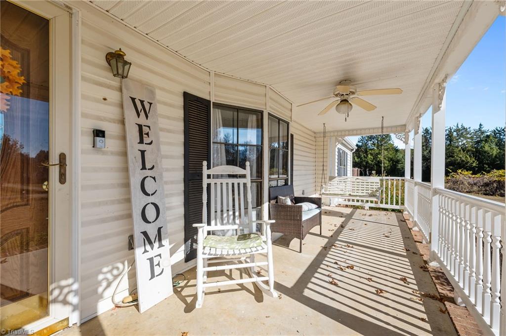 2348 John Thompson Road Graham, NC 27253 - Photo 5 of 34 Rocking chair front porch