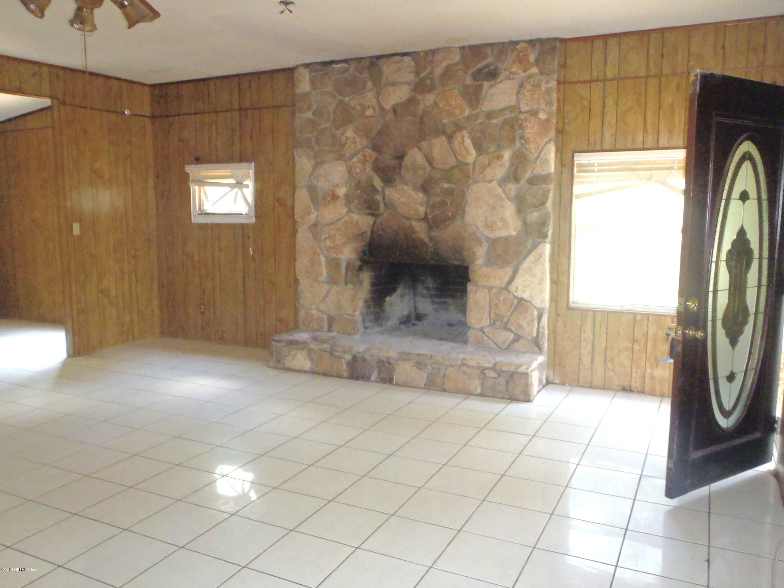 4025 Mustang Road Middleburg, FL 32068 - Photo 6 of 8 a view of entryway with a front door