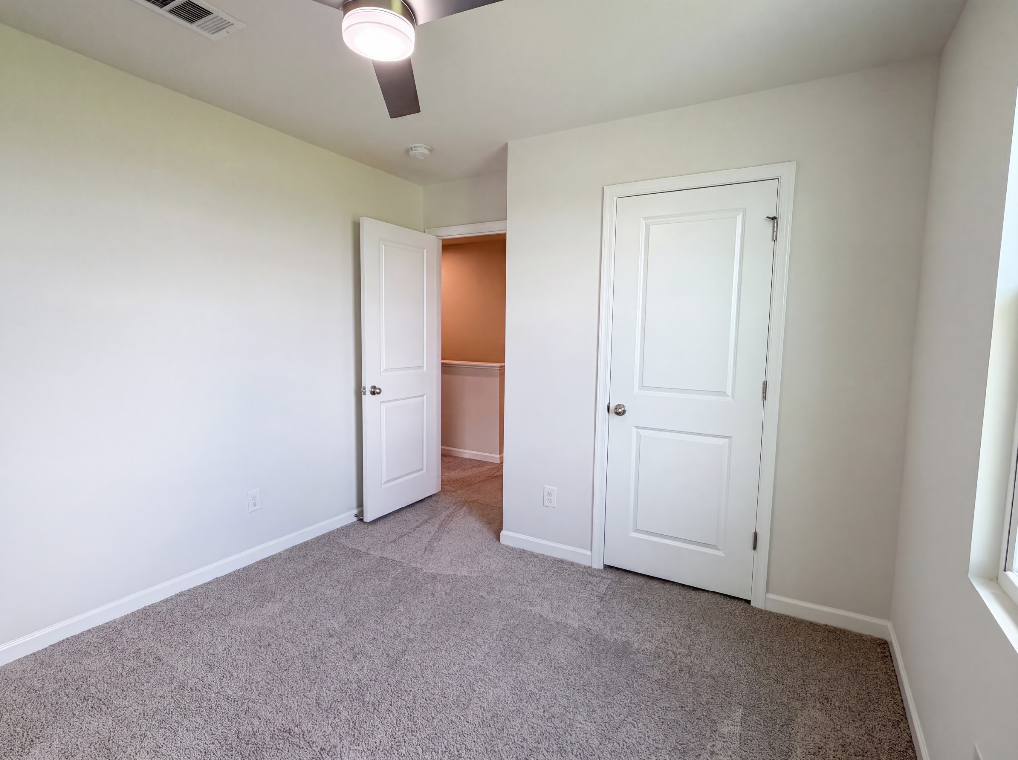 937 Blue Ash Way Christiana, TN 37037 - Photo 11 of 22 an empty room with a ceiling fan
