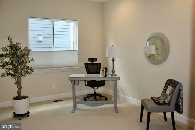 a spacious bathroom with a shower sink and mirror