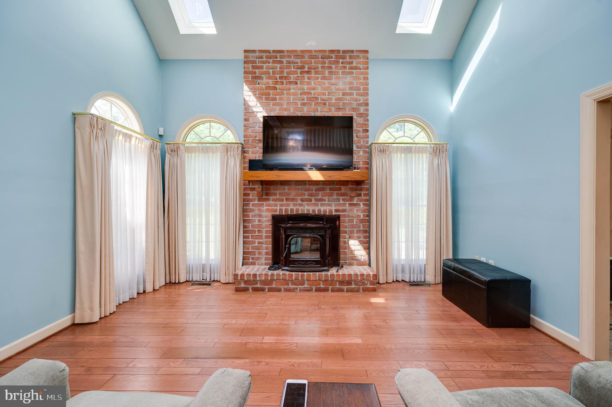 14 Quail Ridge Drive Reading, PA 19607 - Photo 25 of 75 LARGE BRICK FIREPLACE WITH PELLET INCERT