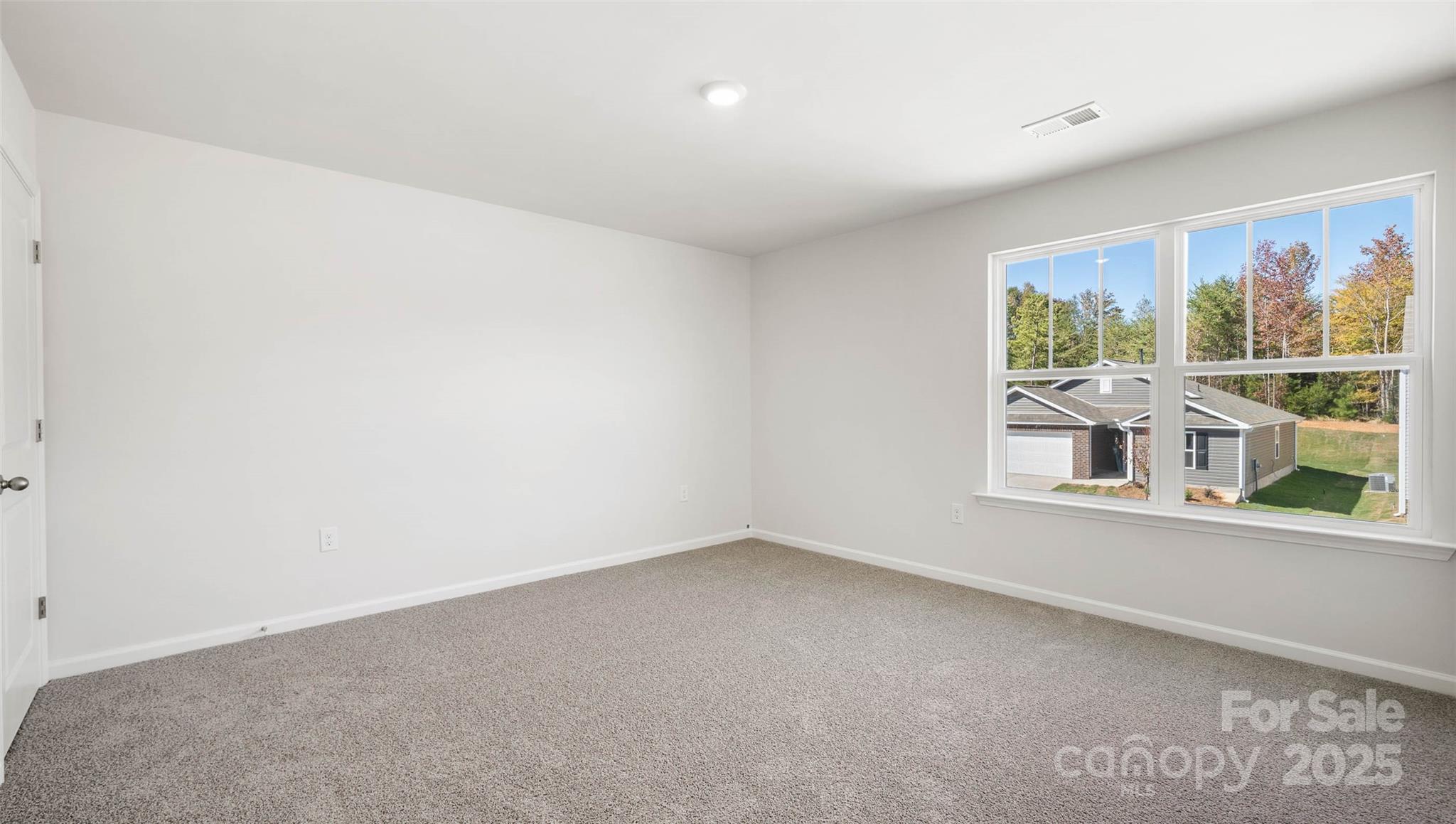 12 Byron Park Road Clyde, NC 28721 - Photo 18 of 20 an empty room with a window