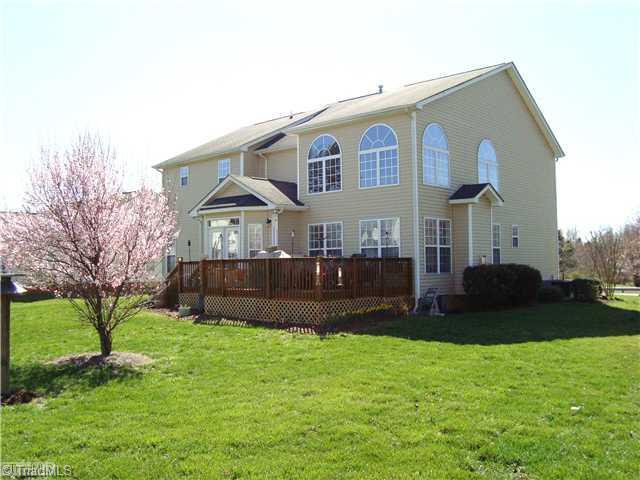 2119 Edgemont Road Greensboro, NC 27406 - Photo 2 of 16 Exterior Back. A beautiful back yard with a deck for grilling & entertaining.