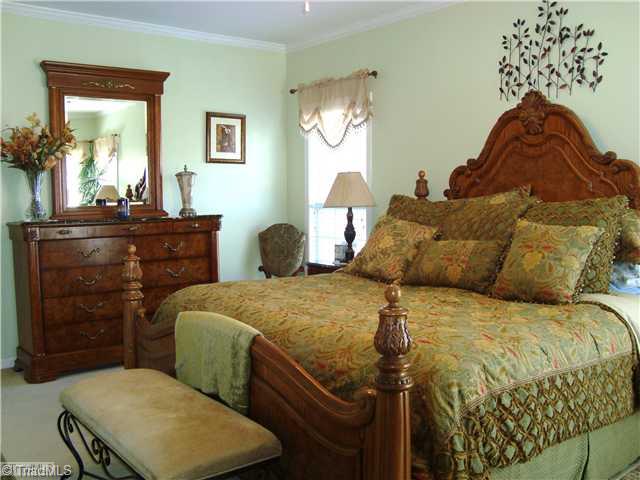 2119 Edgemont Road Greensboro, NC 27406 - Photo 13 of 16 Master Bedroom. This lovely Master has nice light, crown molding and plush carpet. The room can accomodate a queen or king size bed.