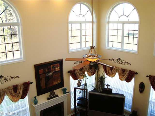 2119 Edgemont Road Greensboro, NC 27406 - Photo 8 of 16 Den/Family/Great Room. This photo was taken from the 2nd floor stairs looking down on the Great Room.
