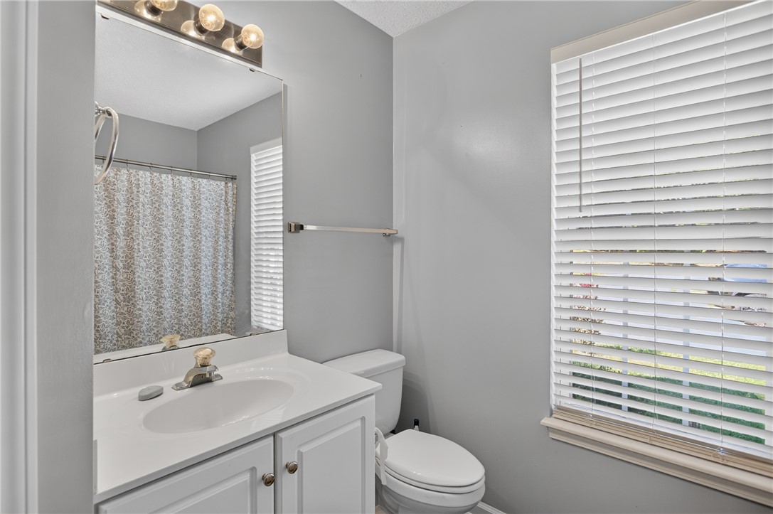 3336 Centerville Road Anderson, SC 29625 - Photo 32 of 50 Functional full bathroom featuring a vanity with integrated sink and bright window.