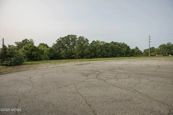 a view of a field with an outdoor space