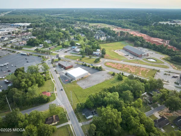 a view of city with ocean