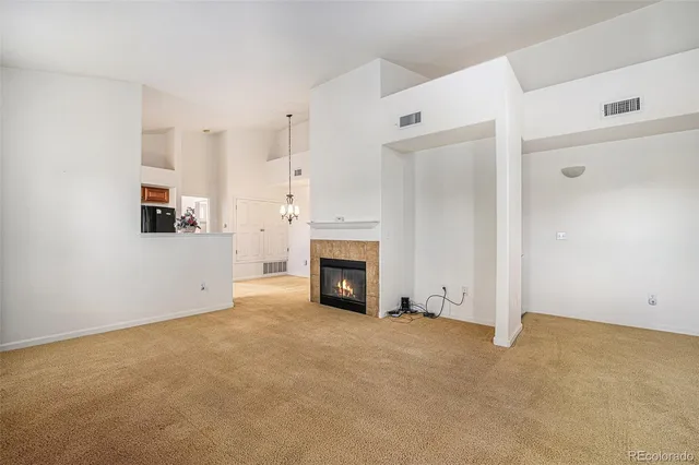 a view of a livingroom with a fireplace