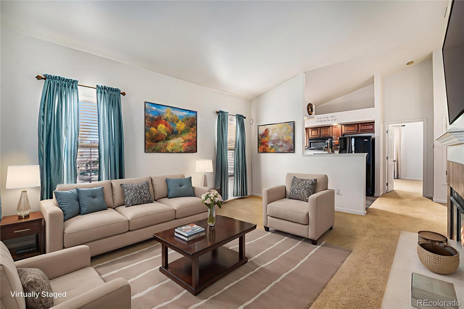 5800 Tower Road, Unit 505 Denver, CO 80249 - Photo 2 of 24 a living room with furniture and a large window