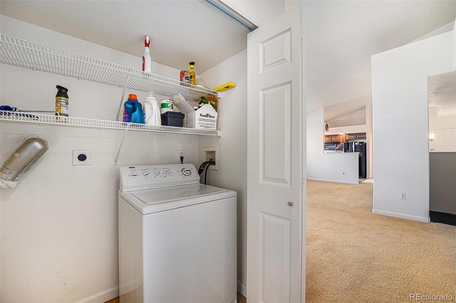 5800 Tower Road, Unit 505 Denver, CO 80249 - Photo 21 of 24 a utility room with dryer and washer