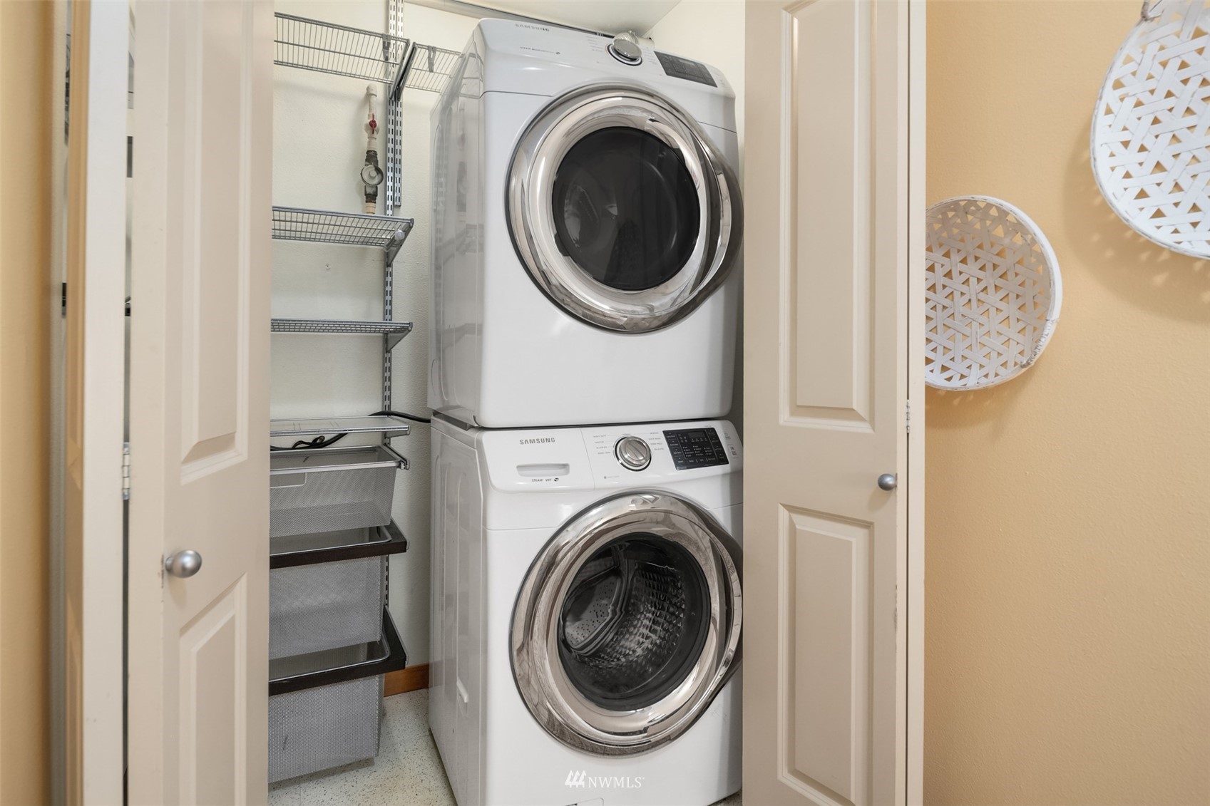 3015 Southwest Avalon Way, Unit 106 Seattle, WA 98126 - Photo 15 of 20 a utility room with dryer and washer
