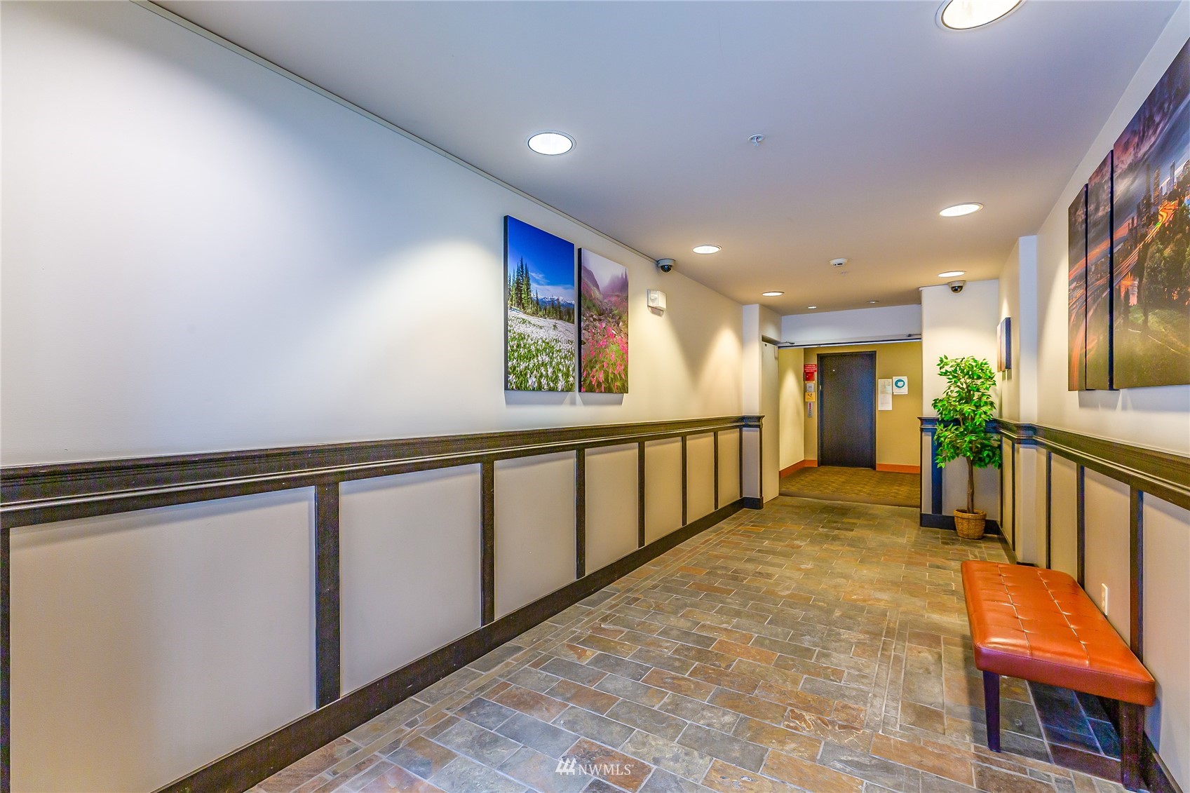 3015 Southwest Avalon Way, Unit 106 Seattle, WA 98126 - Photo 3 of 20 a view of hallway with stairs
