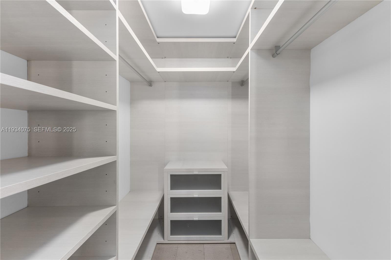 68 Southeast 6th Street, Unit 2006 Miami, FL 33131 - Photo 18 of 49 a view of walk in closet