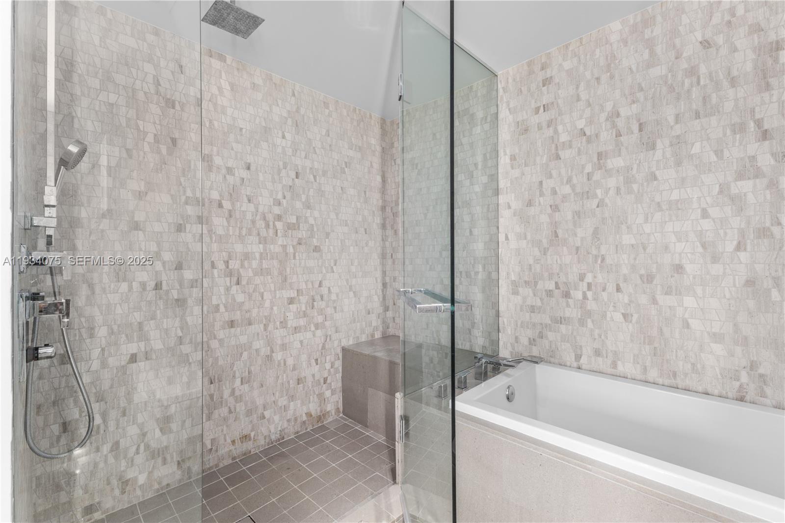 68 Southeast 6th Street, Unit 2006 Miami, FL 33131 - Photo 20 of 49 a bathroom with a bathtub