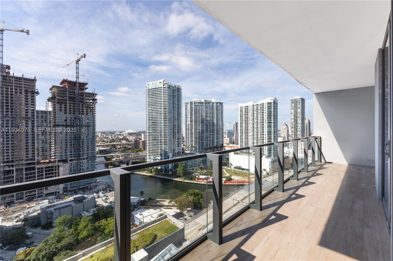 68 Southeast 6th Street, Unit 2006 Miami, FL 33131 - Photo 2 of 49 a view of city from a balcony