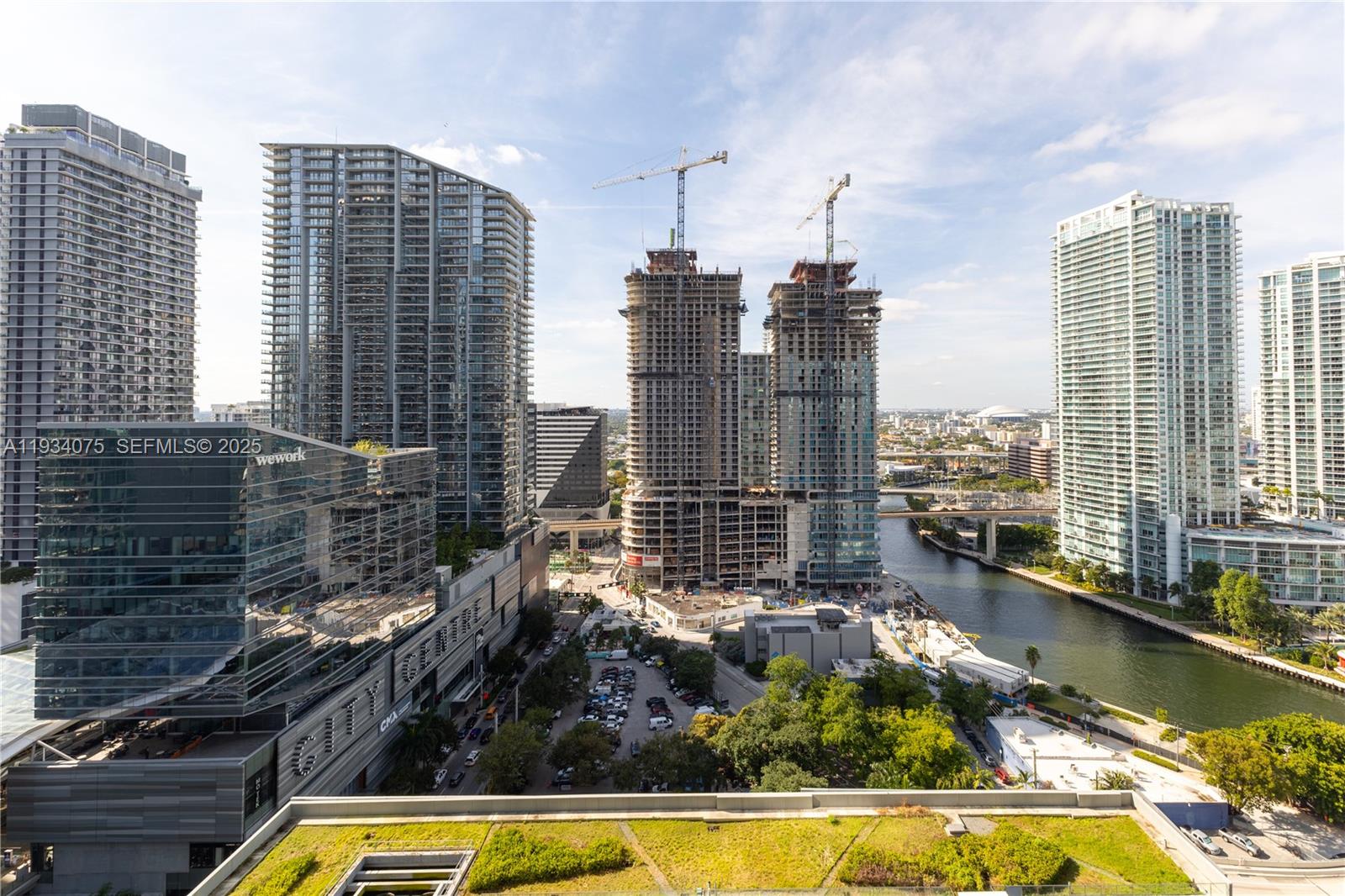 68 Southeast 6th Street, Unit 2006 Miami, FL 33131 - Photo 3 of 49 a view of swimming pool with outdoor seating