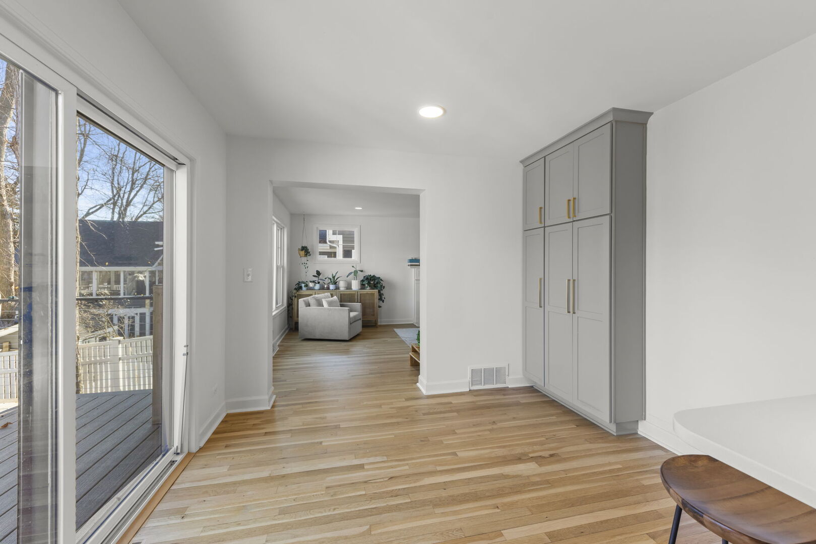 291 Spring Avenue Glen Ellyn, IL 60137 - Photo 12 of 35 a view of a livingroom with wooden floor windows and closet