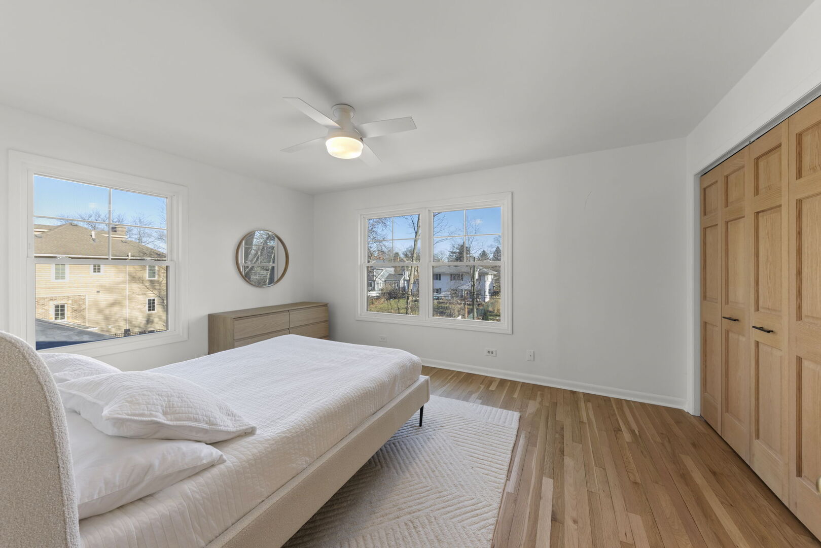 291 Spring Avenue Glen Ellyn, IL 60137 - Photo 16 of 35 a bedroom with a large bed and a window