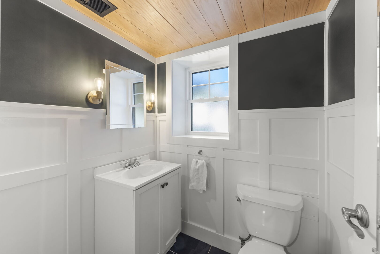 291 Spring Avenue Glen Ellyn, IL 60137 - Photo 27 of 35 a bathroom with a sink toilet and mirror