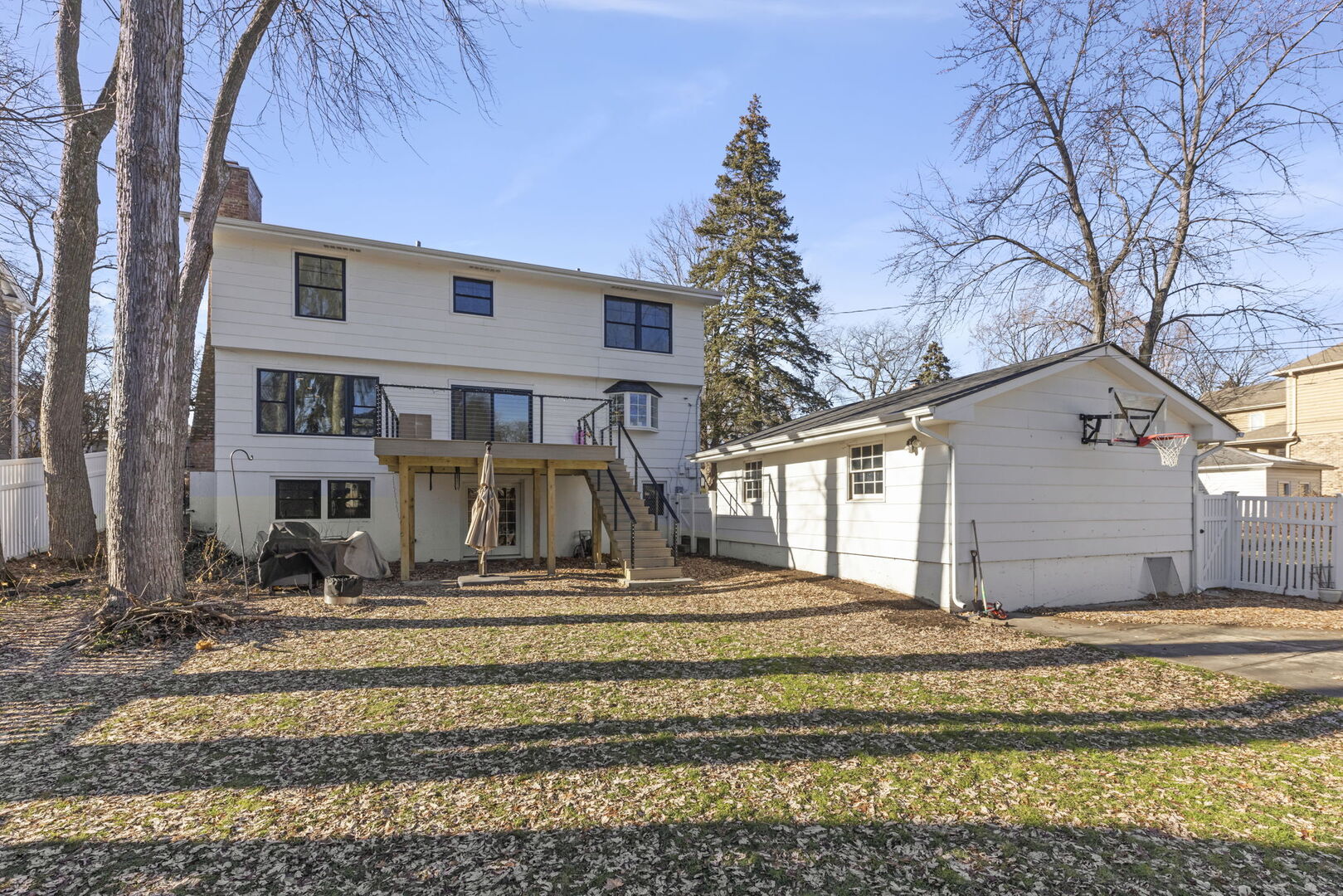 291 Spring Avenue Glen Ellyn, IL 60137 - Photo 30 of 35 a view of a house with a large tree