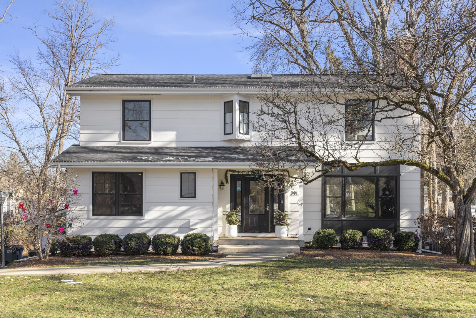 291 Spring Avenue Glen Ellyn, IL 60137 - Photo 35 of 35 a front view of a house with a swimming pool
