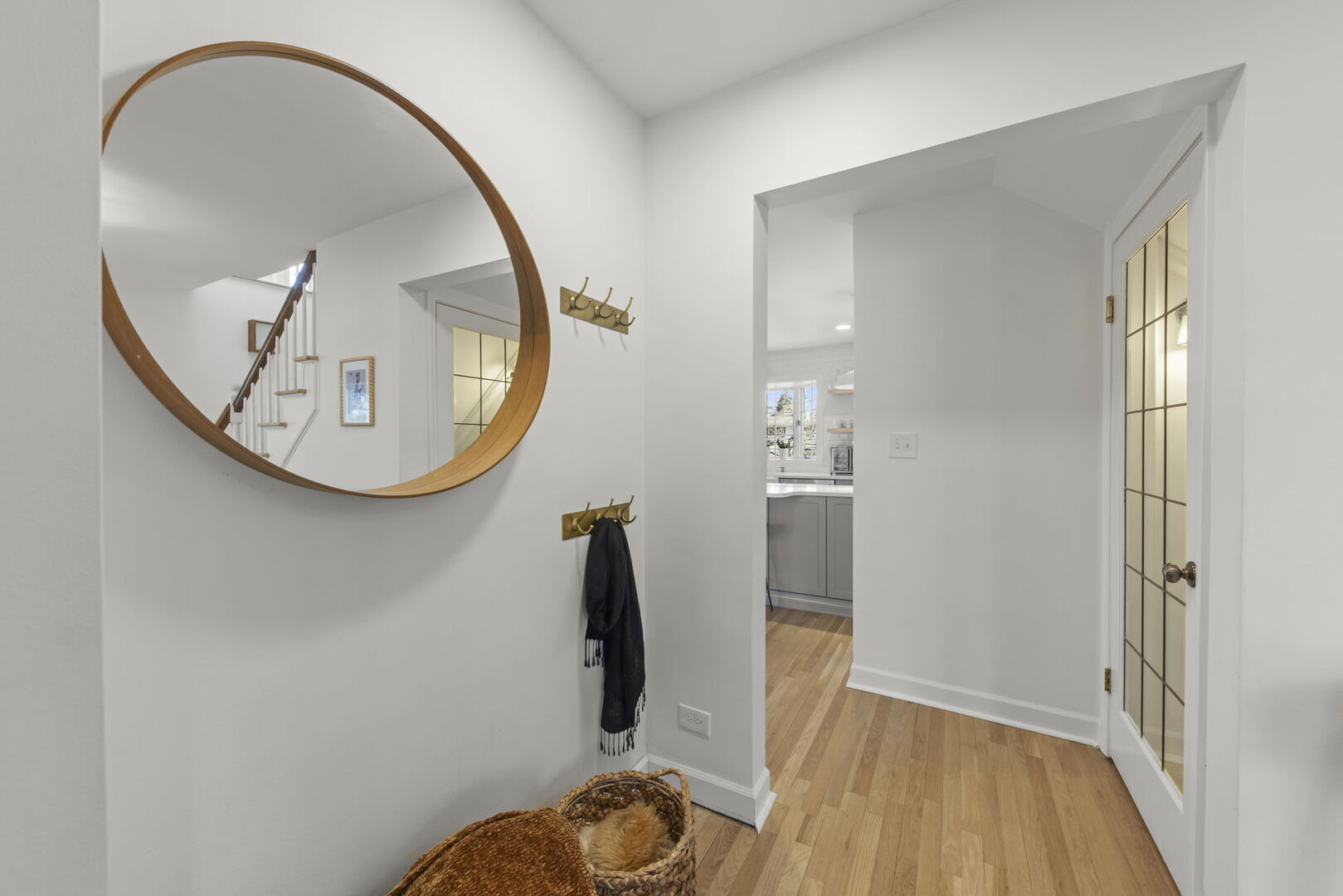 291 Spring Avenue Glen Ellyn, IL 60137 - Photo 4 of 35 a view of a livingroom with wooden floor and a staircase