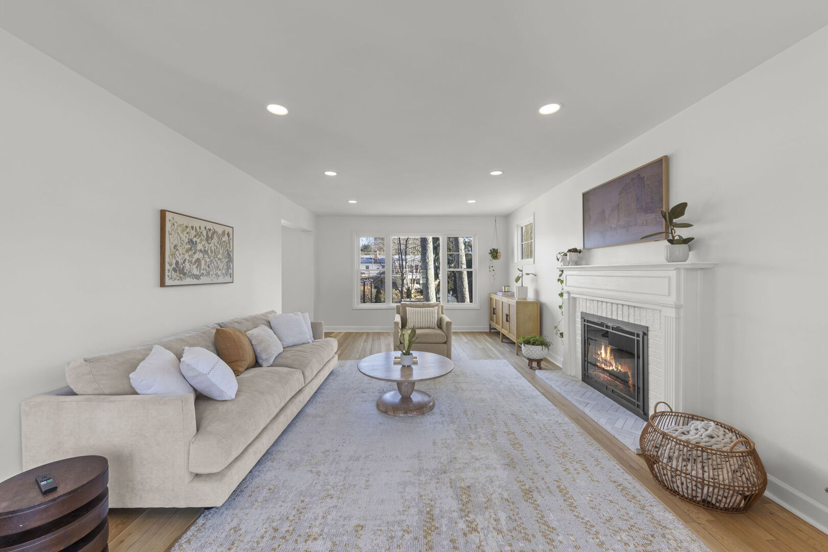 291 Spring Avenue Glen Ellyn, IL 60137 - Photo 6 of 35 a living room with furniture a fireplace and a flat screen tv