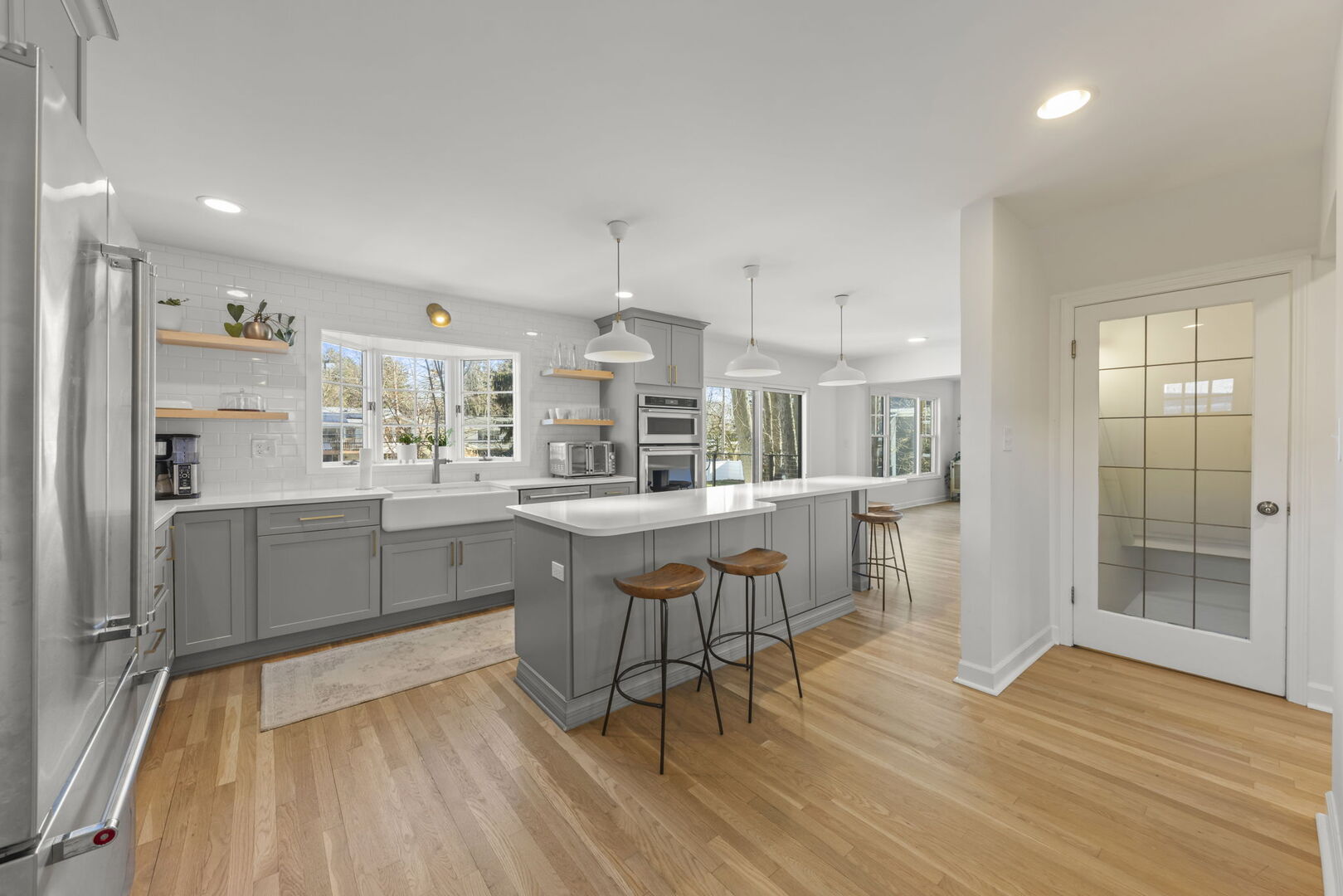 291 Spring Avenue Glen Ellyn, IL 60137 - Photo 8 of 35 a kitchen with a sink cabinets and wooden floor