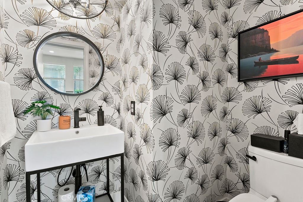 37 Walbert Lane Ladera Ranch, CA 92694 - Photo 11 of 27 a bathroom with a sink and a mirror