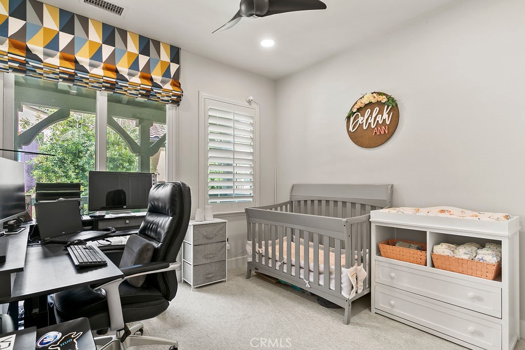 37 Walbert Lane Ladera Ranch, CA 92694 - Photo 17 of 27 a bedroom with furniture and a window