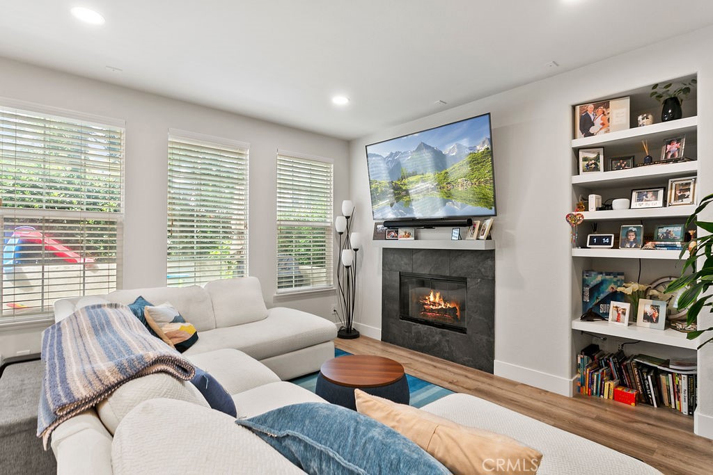 37 Walbert Lane Ladera Ranch, CA 92694 - Photo 5 of 27 a living room with furniture and a fireplace