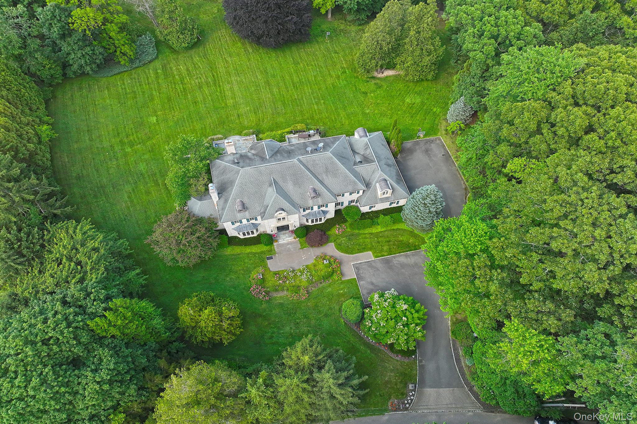 14 Norgate Road Glen Head, NY 11545 - Photo 44 of 44 an aerial view of a house with a yard