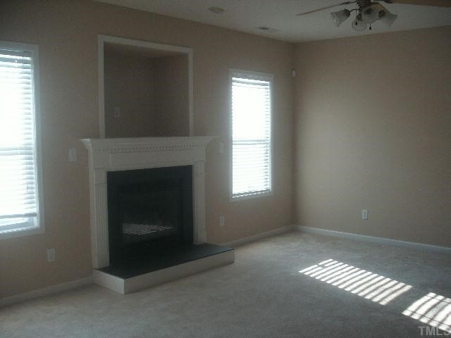 3975 Cane Garden Drive Raleigh, NC 27610 - Photo 4 of 7 Livingroom w/gaslog fireplace & entertainment niche