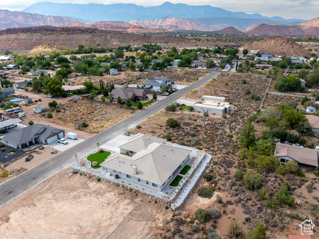 230 Boulder Way Leeds, UT 84746 - Photo 57 of 72 Aerial perspective of suburban area featuring mountains and a desert landscape