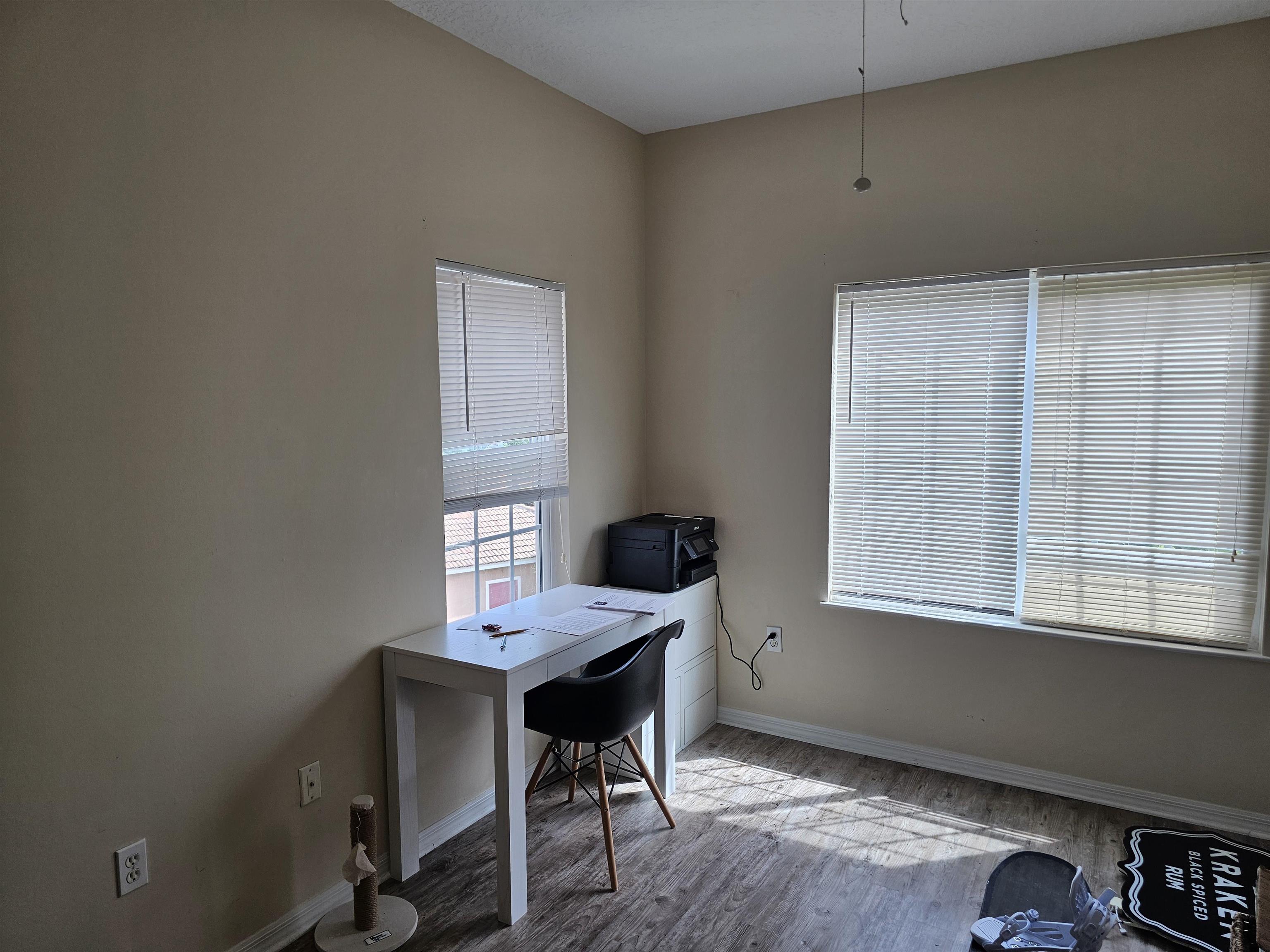 605 Fairway Drive, Unit 307 St. Augustine, FL 32084 - Photo 7 of 16 a workspace with furniture and window